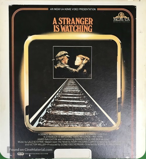 A Stranger Is Watching - Movie Cover